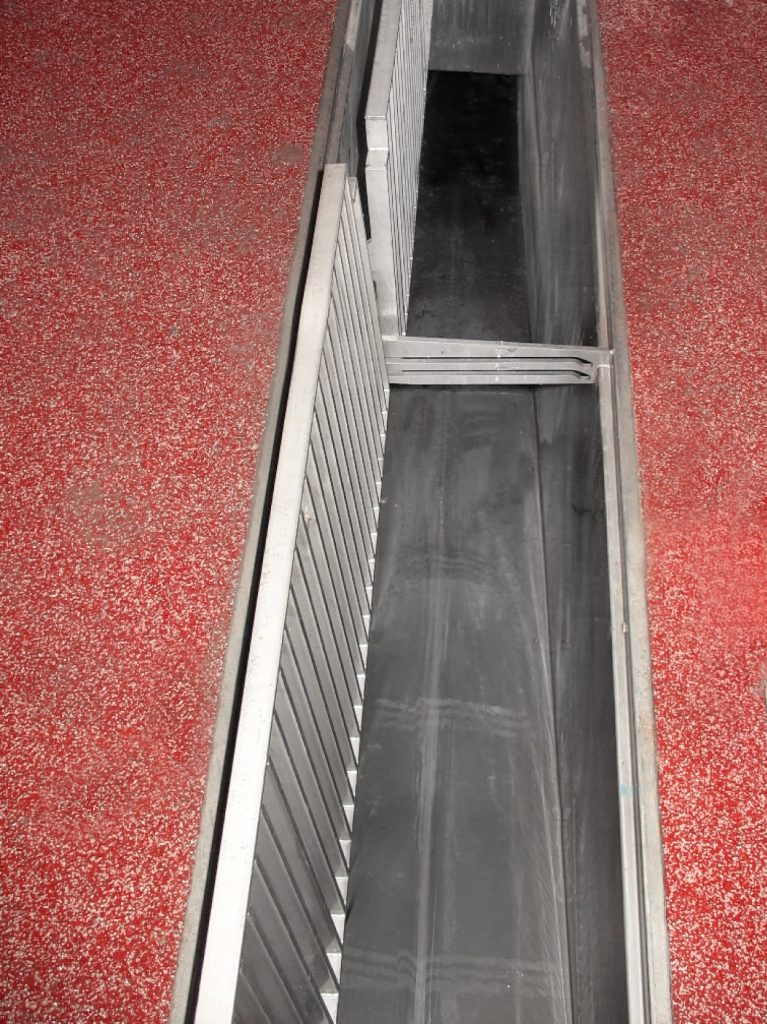 OzFlow stainless steel drain channel installation