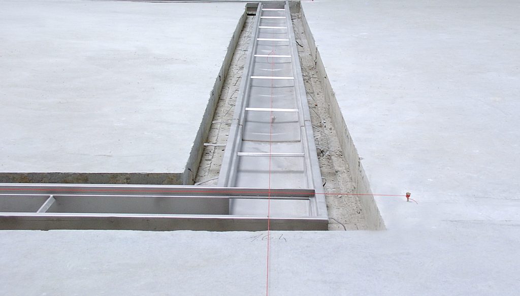 OzFlow stainless steel drain channel installation