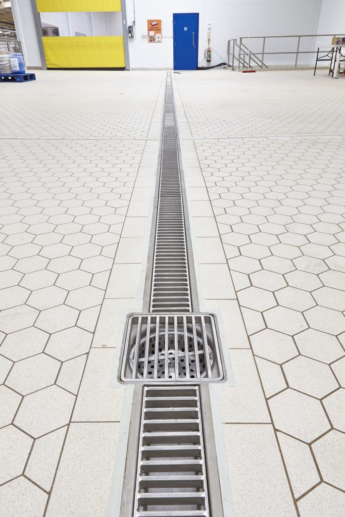 OzFlow stainless steel drain channel — AG Barr Brewery installation