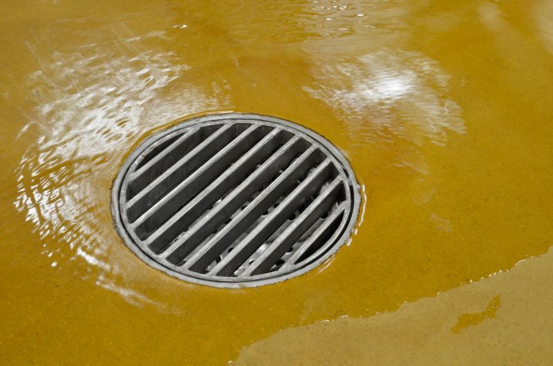 OzFlow stainless steel drain channel — Tomlinson installation